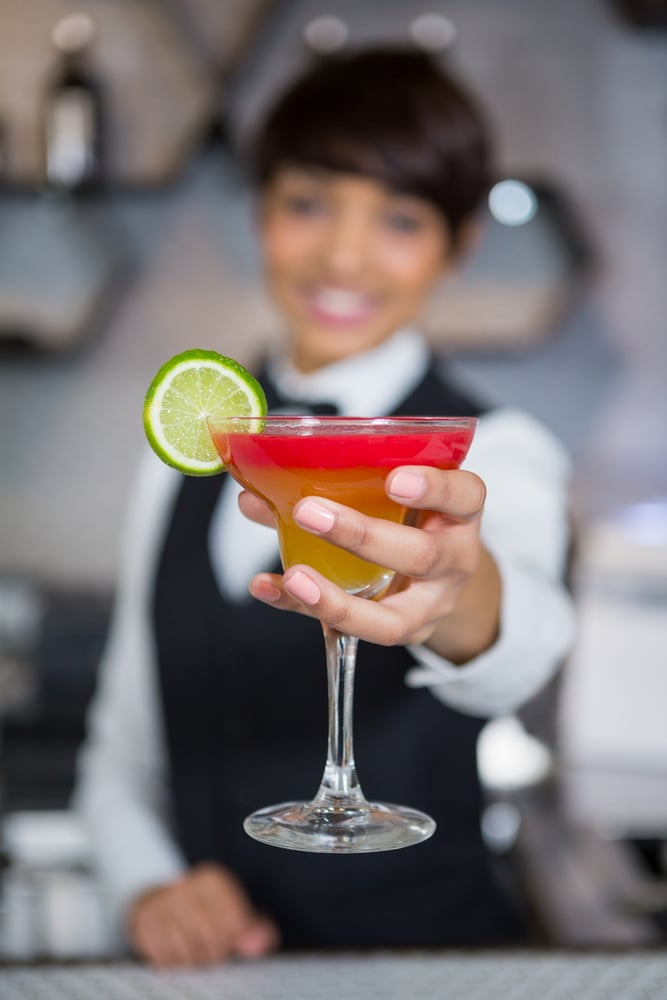 bartender serving cocktail