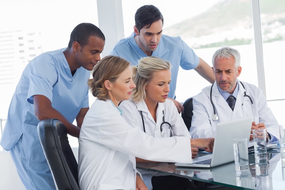 doctors and nurses at computer